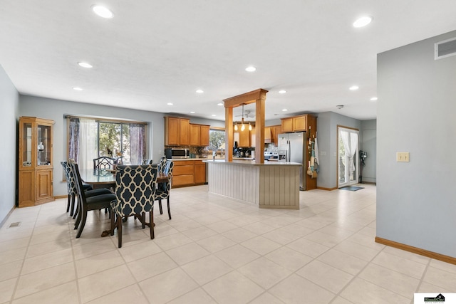 9521 N 140th St, Waverly, NE 68462 - dining space with recessed lighting, baseboards, and light tile patterned floors