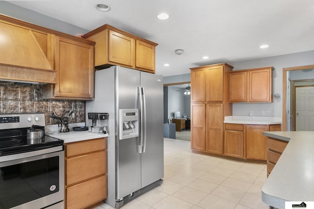 9521 N 140th St, Waverly, NE 68462 - kitchen featuring appliances with stainless steel finishes, premium range hood, ceiling fan, light countertops, and recessed lighting