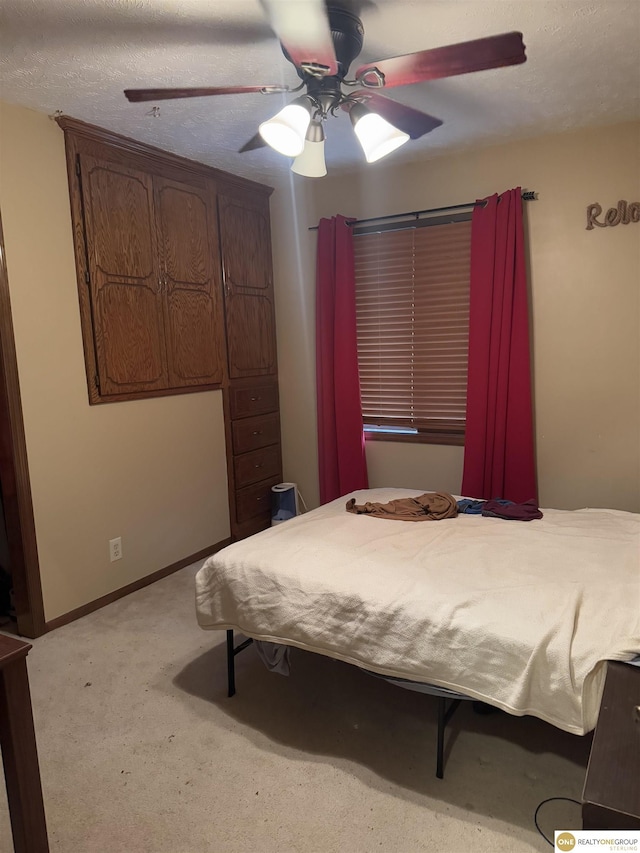 826 Hidden Hills Dr, Bellevue, NE 68005 - carpeted bedroom featuring a ceiling fan