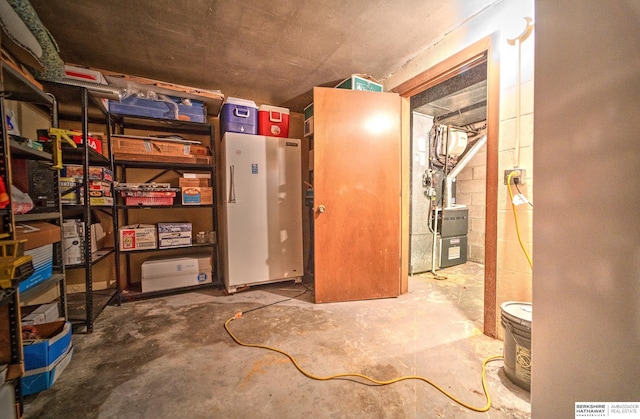 1915 S 131st Ave, Omaha, NE 68144 - unfinished basement with freestanding refrigerator and concrete block wall