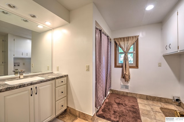 1915 S 131st Ave, Omaha, NE 68144 - full bathroom with vanity, recessed lighting, baseboards, and a shower with shower curtain