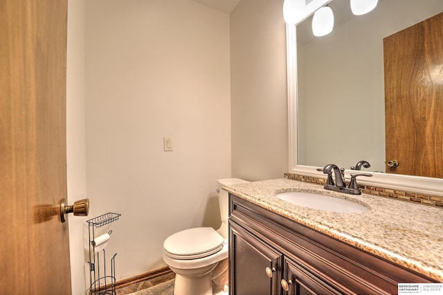 1915 S 131st Ave, Omaha, NE 68144 - half bathroom featuring vanity and toilet