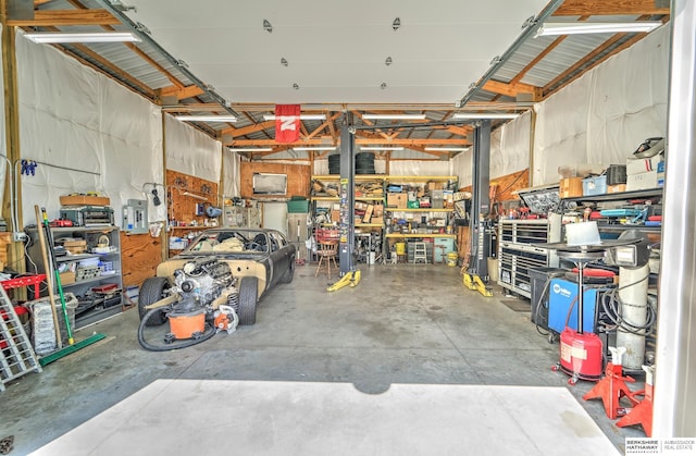 1915 S 131st Ave, Omaha, NE 68144 - garage featuring a workshop area