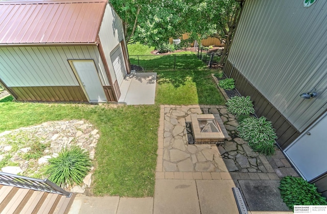 1915 S 131st Ave, Omaha, NE 68144 - view of yard with an outdoor structure and a garage