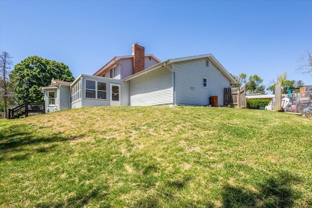 1511 Lorraine Ave, Bellevue, NE 68005 - rear view of property with a chimney