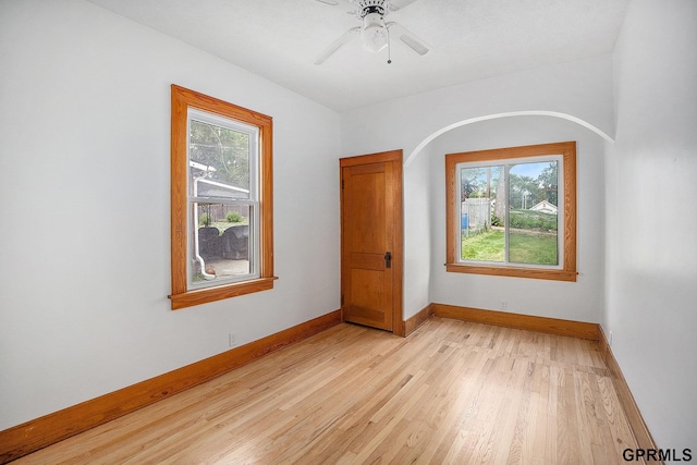4315 N 39th St, Omaha, NE 68111 - spare room featuring healthy amount of natural light, baseboards, light wood-type flooring, and ceiling fan