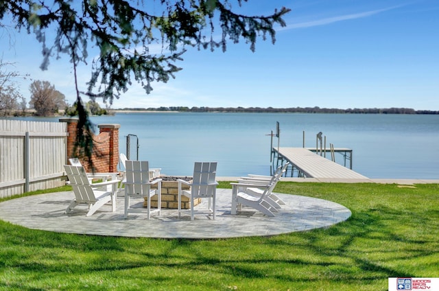 209 N Maloney Dr, North Platte, NE 69101 - dock area featuring an outdoor fire pit, a water view, and a patio area