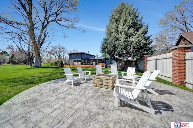 209 N Maloney Dr, North Platte, NE 69101 - view of patio featuring an outdoor fire pit