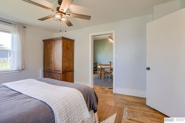 4332 Vinton St, Omaha, NE 68105 - bedroom with light wood-style floors, baseboards, and ceiling fan