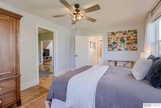 4332 Vinton St, Omaha, NE 68105 - bedroom featuring light wood-style flooring, baseboards, and a ceiling fan
