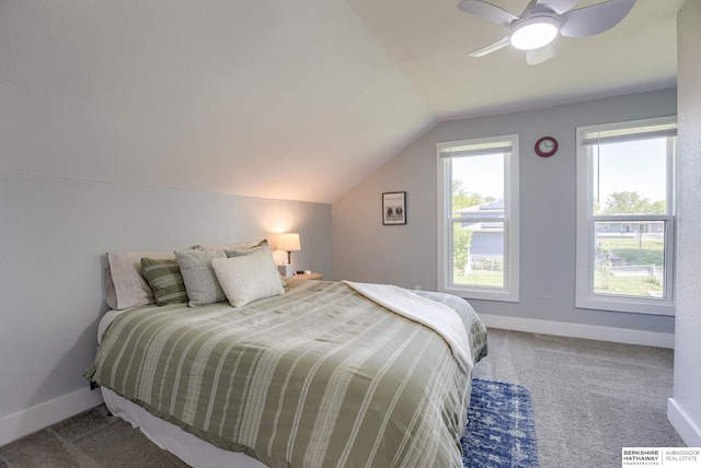 4332 Vinton St, Omaha, NE 68105 - carpeted bedroom featuring vaulted ceiling, baseboards, and a ceiling fan