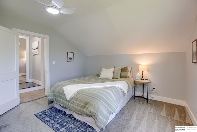 4332 Vinton St, Omaha, NE 68105 - carpeted bedroom featuring lofted ceiling, baseboards, and a ceiling fan