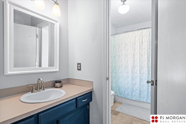 5517 S 174th Ave, Omaha, NE 68135 - bathroom with vanity and tile patterned flooring