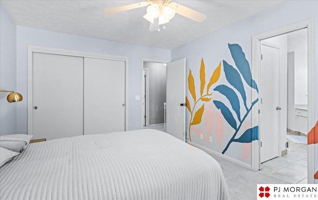 5517 S 174th Ave, Omaha, NE 68135 - bedroom featuring a closet, a ceiling fan, and carpet