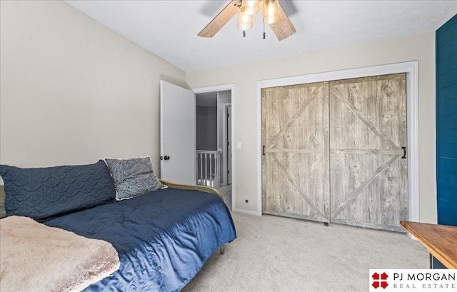5517 S 174th Ave, Omaha, NE 68135 - carpeted bedroom featuring a ceiling fan and baseboards