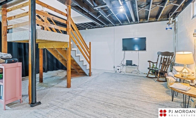 5517 S 174th Ave, Omaha, NE 68135 - unfinished basement featuring stairway, concrete block wall, and carpet