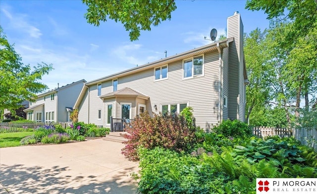 5517 S 174th Ave, Omaha, NE 68135 - view of front facade with a chimney