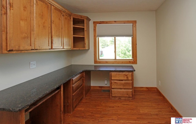 1912 SW 25th St, Lincoln, NE 68522 - unfurnished office with built in desk and wood finished floors