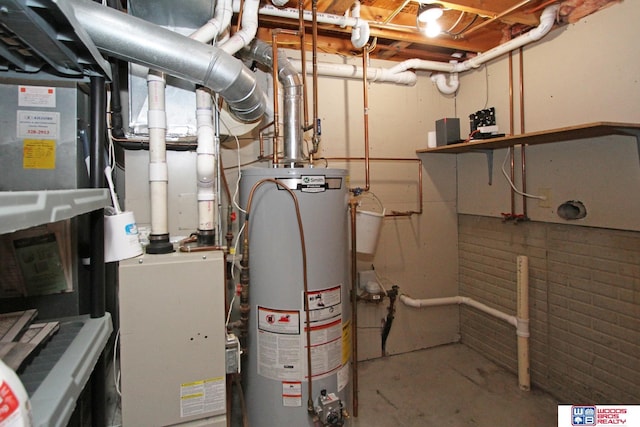 1912 SW 25th St, Lincoln, NE 68522 - utility room with water heater