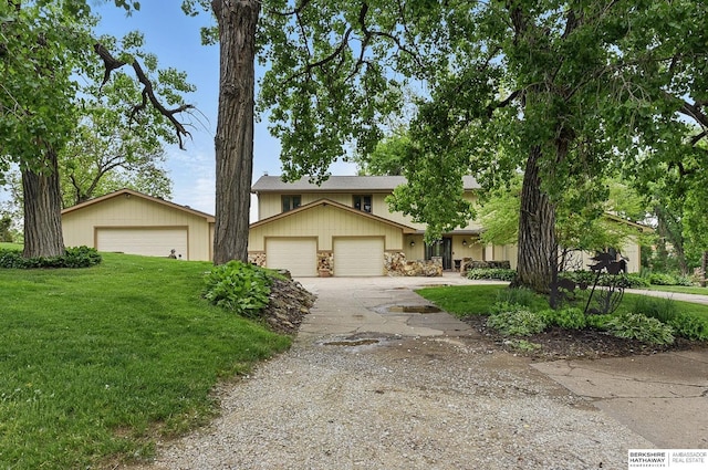 2564 County Road 12, Fremont, NE 68025 - view of front of home featuring a front lawn and a garage