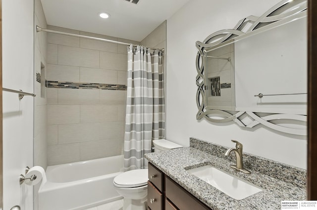 2564 County Road 12, Fremont, NE 68025 - full bathroom featuring toilet, shower / bath combination with curtain, vanity, and recessed lighting
