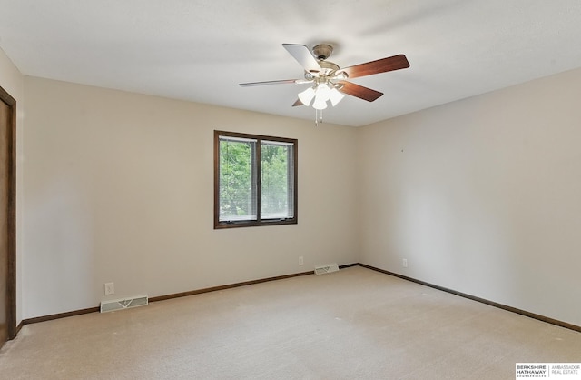 2564 County Road 12, Fremont, NE 68025 - empty room with ceiling fan, carpet, and baseboards