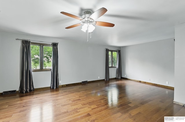 2564 County Road 12, Fremont, NE 68025 - spare room featuring healthy amount of natural light, ceiling fan, and wood finished floors