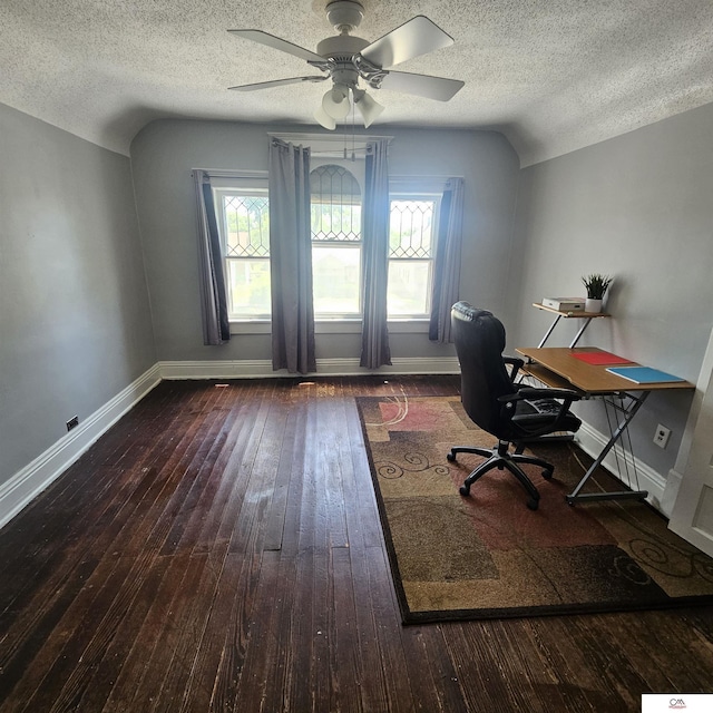 1119 H St, Fairbury, NE 68352 - office area with wood-type flooring, baseboards, ceiling fan, and a textured ceiling