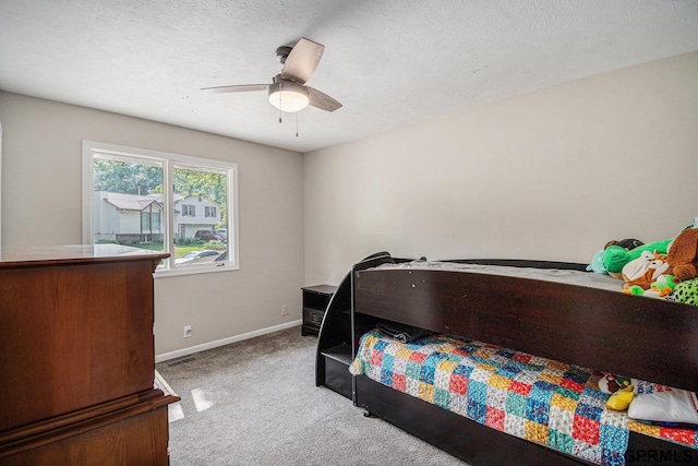 13055 Brookside Dr, Bellevue, NE 68123 - bedroom featuring carpet, baseboards, and a ceiling fan