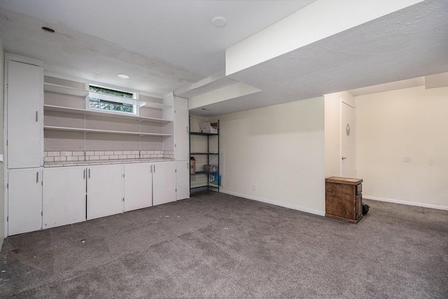 13055 Brookside Dr, Bellevue, NE 68123 - below grade area with carpet floors and baseboards