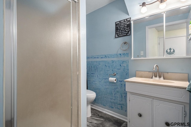 13055 Brookside Dr, Bellevue, NE 68123 - bathroom with toilet, marble look tiles, vanity, and baseboards