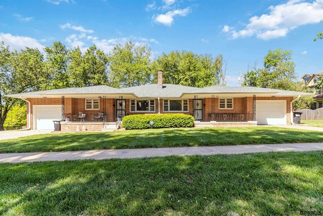 2206 N 56th St, Omaha, NE 68104 - single story home with an attached garage, brick siding, and a front lawn