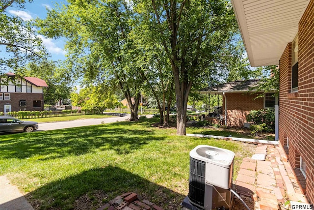 2206 N 56th St, Omaha, NE 68104 - view of grassy yard with cooling unit