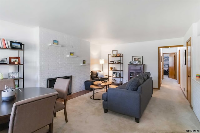 2206 N 56th St, Omaha, NE 68104 - living area featuring a fireplace and light carpet