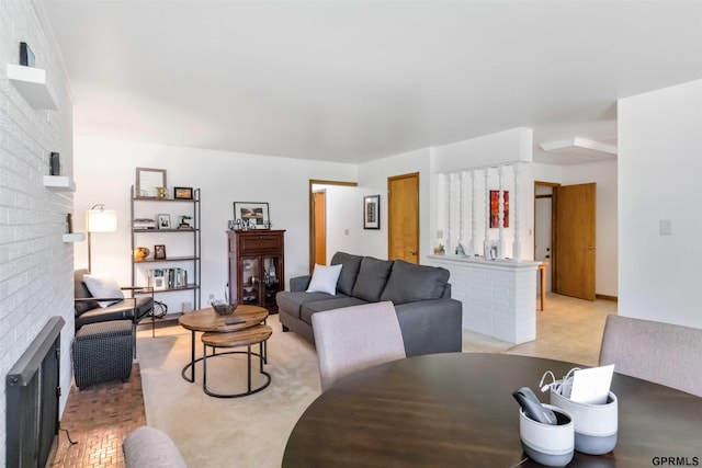 2206 N 56th St, Omaha, NE 68104 - living room featuring a brick fireplace