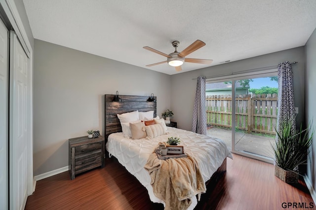 1625 Granada Ln, Lincoln, NE 68528 - bedroom featuring access to outside, baseboards, wood finished floors, ceiling fan, and a textured ceiling