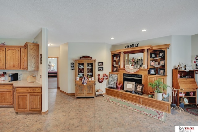 40798 US Highway 6, Cambridge, NE 69022 - living room with a textured ceiling, recessed lighting, and a fireplace