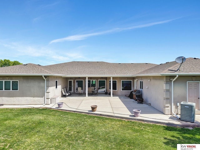 40798 US Highway 6, Cambridge, NE 69022 - back of house featuring stucco siding, cooling unit, a yard, and roof with shingles
