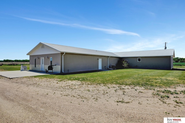 40798 US Highway 6, Cambridge, NE 69022 - ranch-style house with metal roof and a front yard
