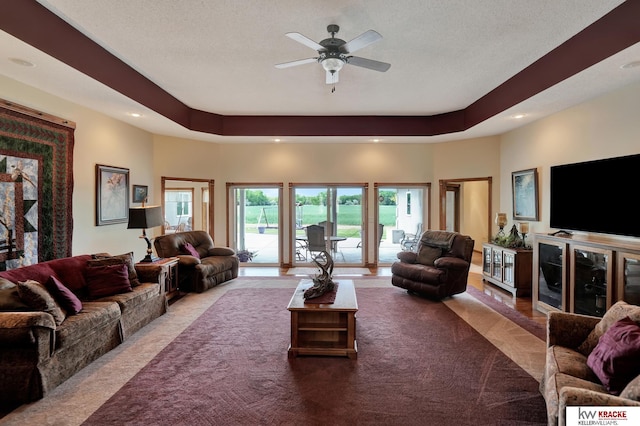 40798 US Highway 6, Cambridge, NE 69022 - living area featuring a ceiling fan, recessed lighting, carpet, and a tray ceiling