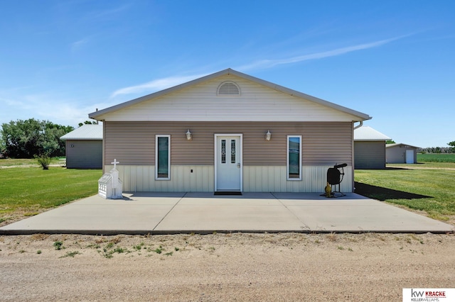 40798 US Highway 6, Cambridge, NE 69022 - back of house with a patio area and a lawn