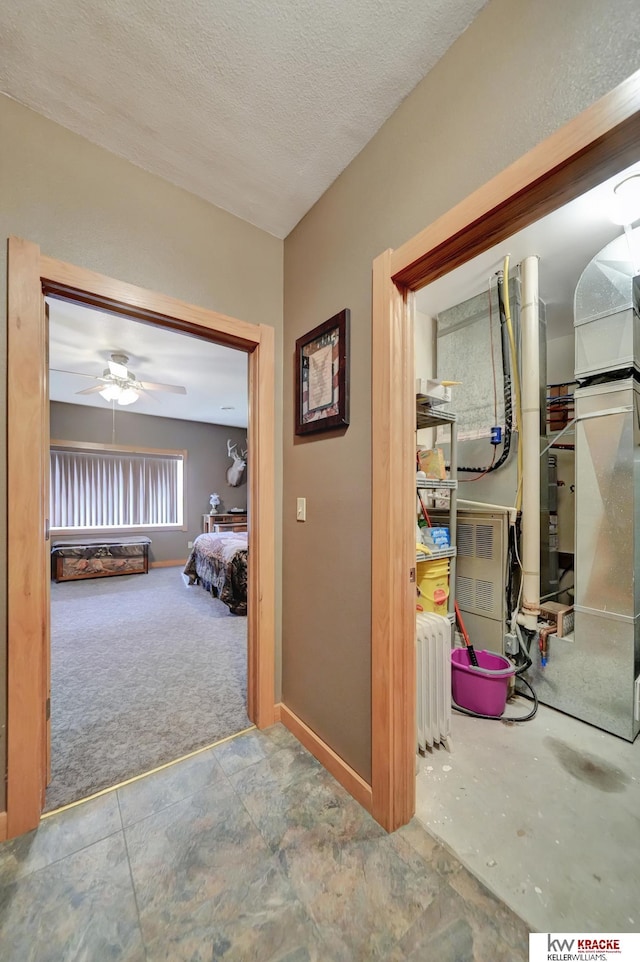 40798 US Highway 6, Cambridge, NE 69022 - corridor with baseboards, a textured ceiling, and carpet