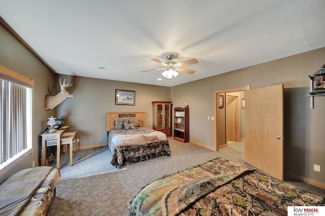 40798 US Highway 6, Cambridge, NE 69022 - bedroom with light colored carpet, a ceiling fan, and baseboards