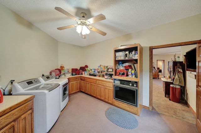 40798 US Highway 6, Cambridge, NE 69022 - washroom with separate washer and dryer, light colored carpet, ceiling fan, and a textured ceiling