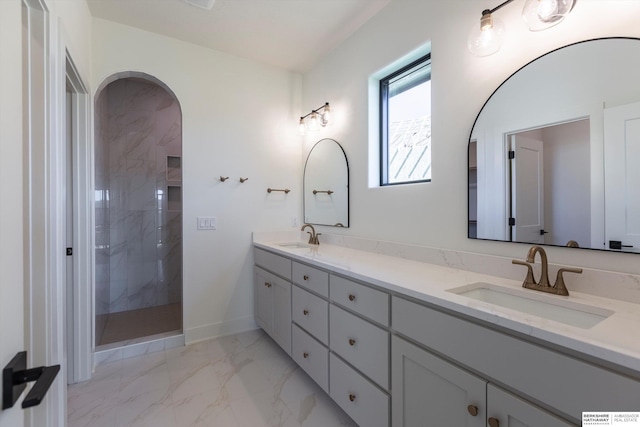 11019 N 166th St, Bennington, NE 68007 - bathroom featuring marble look tiles, double vanity, a marble finish shower, and baseboards