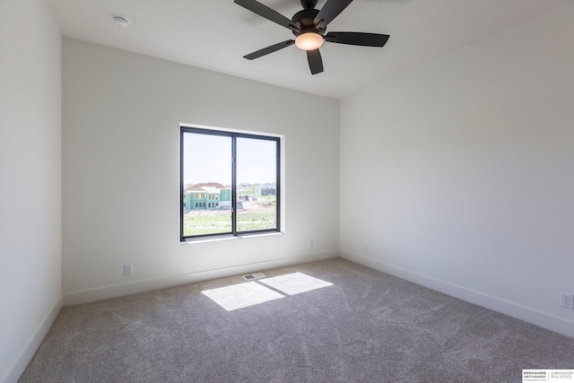 11019 N 166th St, Bennington, NE 68007 - unfurnished room with light carpet, baseboards, and ceiling fan