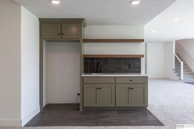 11019 N 166th St, Bennington, NE 68007 - kitchen featuring open shelves, a sink, recessed lighting, baseboards, and light countertops