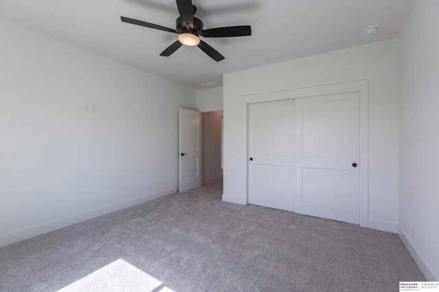 11019 N 166th St, Bennington, NE 68007 - unfurnished bedroom featuring light carpet, a closet, and baseboards