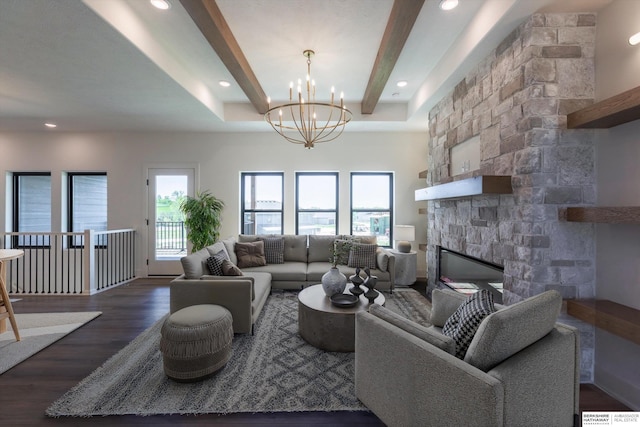 11019 N 166th St, Bennington, NE 68007 - living room featuring wood finished floors, a chandelier, a fireplace, and recessed lighting