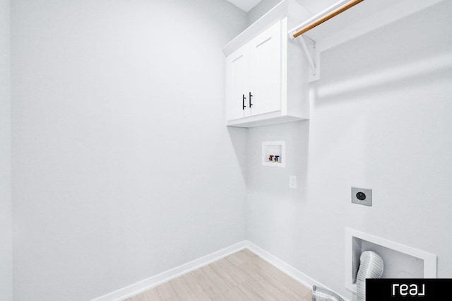 12003 S 109th St, Papillion, NE 68046 - washroom featuring washer hookup, electric dryer hookup, baseboards, and cabinet space